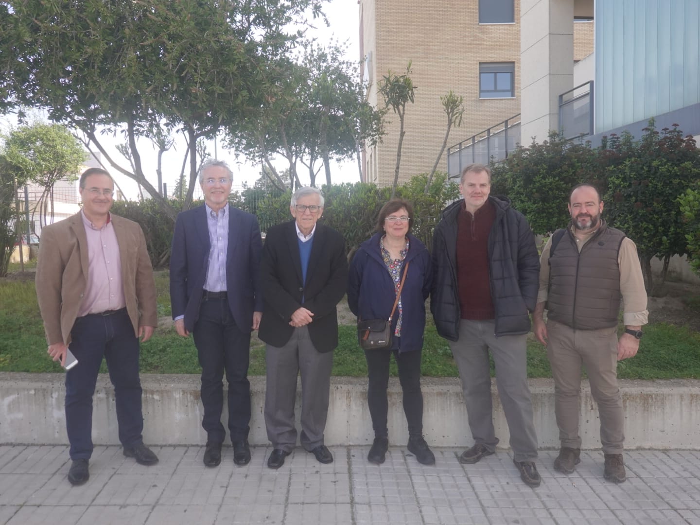 El director del Centro Universitario y representantes de otras entidades participantes en la jornada 