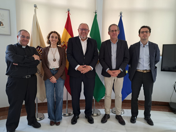 Representantes de ambas instituciones.