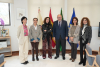 En el centro, la presidenta de Enresa y el rector con las representantes de ambas instituciones que participaron en la reunión.